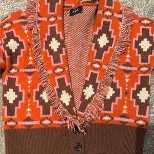Cider wool sweater in orange brown geometric patterns